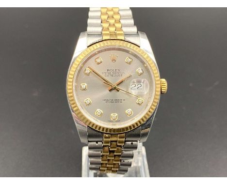         Summary:the jewelled, automatic movement (unseen) to a signed, silvered dial with gem set markers, baton hands, sweep