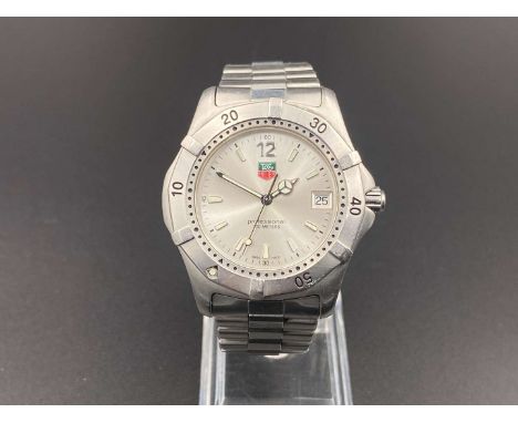         Summary:The quartz movement (unseen) to a signed, silvered dial with luminous baton markers and hands with sweep cent