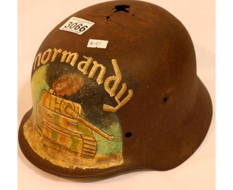WWII German Normandy relic M40 helmet with post war memorial painting. P&amp;P Group 2 (£18+VAT for the first lot and £3+VAT 