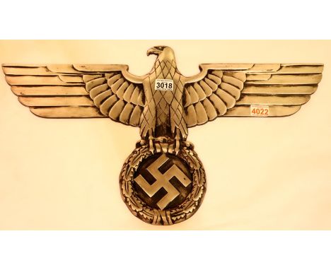 An NSDAP Railway eagle, large reproduction in cast metal, having threaded holes for mounting verso, wingspan 70 cm. P&amp;P G