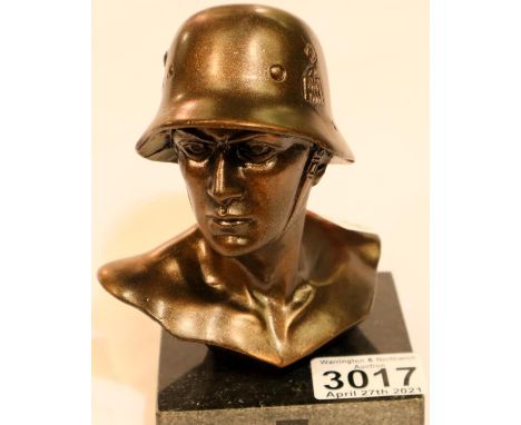 A cast metal bronzed bust, The Heroic German, raised on a square granite plinth, H: 14 cm. P&amp;P Group 1 (£14+VAT for the f