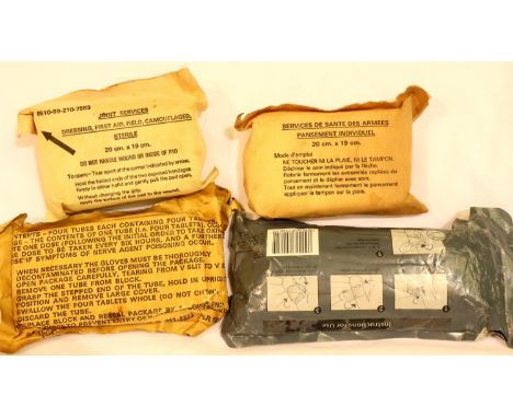 Four sets of packed military medical supplies, with large Jewish star and Falkland badges. P&amp;P Group 1 (£14+VAT for the f
