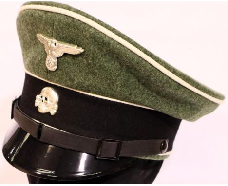 German SS officers peaked cap, size 56 with metal Totenkopf skull and eagle, brand new with tags. P&amp;P Group 2 (£18+VAT fo