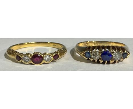 An 18ct gold five stone sapphire and diamond ring, size L, 3g, boxed; an 18ct gold five stone diamond and ruby ring, size N, 