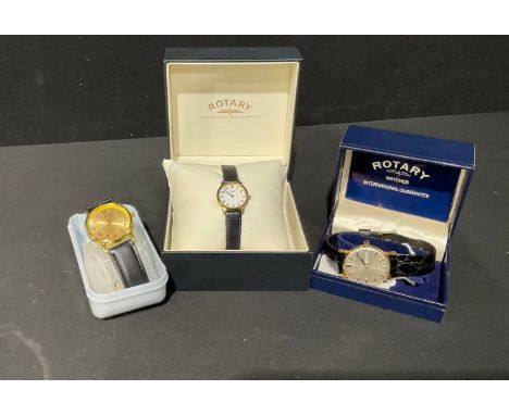 A gentleman's gold plated Rotary watch, silvered dial, baton indicators, day/date aperture, centre seconds, number 1169, blac