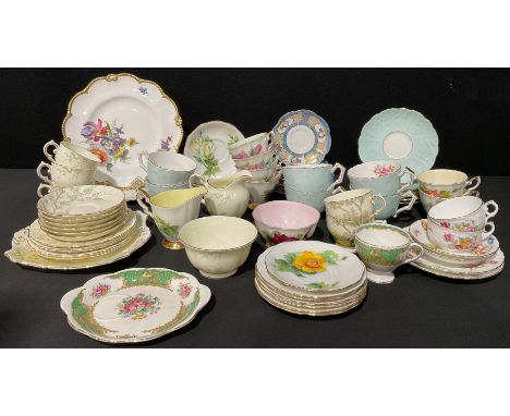 A Royal Standard tea service for six, Authentic World Famous Roses, by Harry Wheatcroft, comprising cake plate, side plates, 