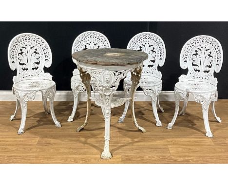 A cast iron tripod public house table, 75cm high, 63cm diameter; a set of four 19th century style aluminium garden chairs, 85