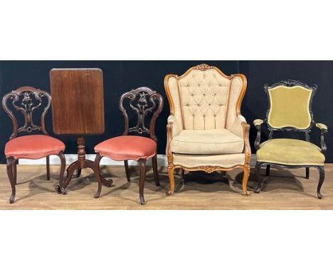 A pair of late Victorian side chairs; a Victorian mahogany tripod occasional table; a 19th century style wing chair; an Edwar