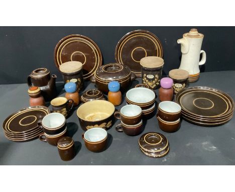 A Denby Gourmet Chocolate part dinner and tea service, comprising tureen and cover, dinner plates, dessert plates, teapot, cu