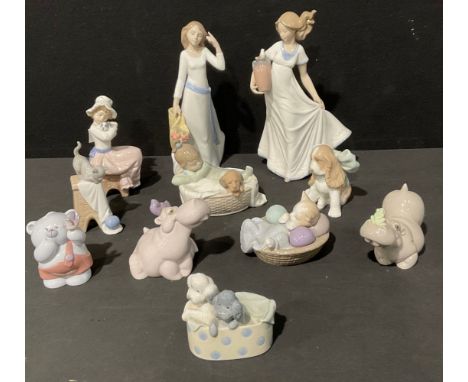 A Spanish porcelain Nao figure, girl with long dress; others, girl with puppy, hippos, kittens, puppies, qty (11) 