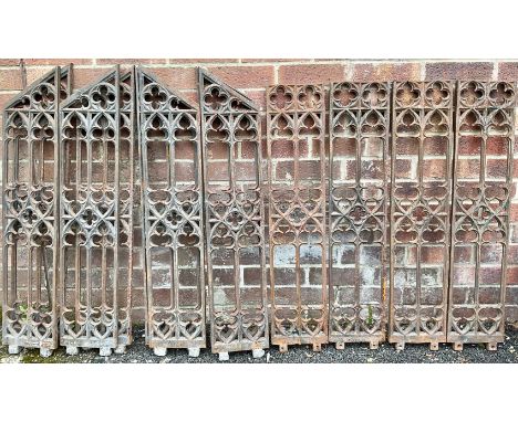 Architectural Salvage - a suite of twelve Gothic Revival cast iron grilles or balusters, cast with tracery, the rectangular 8