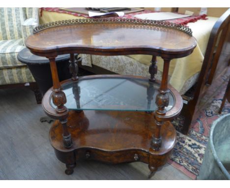 A kidney shaped three tier walnut table, central glass shelf, drawer to base, 73cm (w) x 80cm (h)