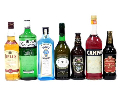 A bottle of Bombay Sapphire gin, 100cl, Gordon's gin, 100cl, Bell's Extra Special Old Scotch whisky, aged 8 years, 70cl, toge