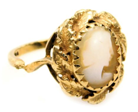 A cameo ring, bust portrait of a lady, in a basket mount with a surround of leaves, cut, approx size K, 4.4g.