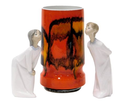 A Poole pottery Delphis pattern vase, shape number 84, printed and painted marks, 23cm high, together with two Lladro porcela