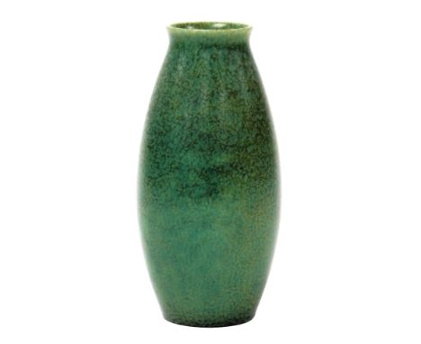 An early 20thC Pilkington's Royal Lancastrian pottery vase, of ovoid form, decorated in a mottled green glaze, number 2559, i