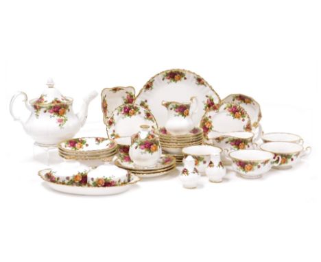 A group of Royal Albert Old Country Roses porcelain tea and dinner wares, including a teapot, soup cups, fruit bowls, preserv