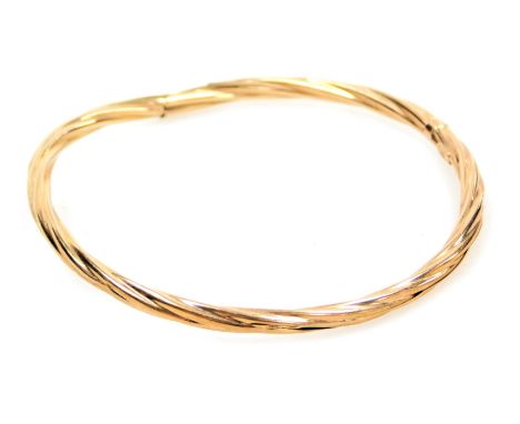 A 9ct gold rope twist hollow bangle, 3.3g. (AF)