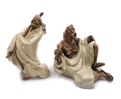 Two 20thC Chinese mudmen figures, of immortals, one seated holding a stick and a pot, bears seal mark, 20.5cm wide, the other