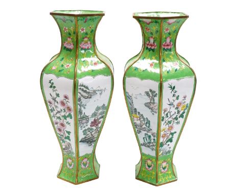 A pair of Chinese enamel famille verte vases, of hexagonal baluster form, decorated with reserves of landscapes, birds and bl