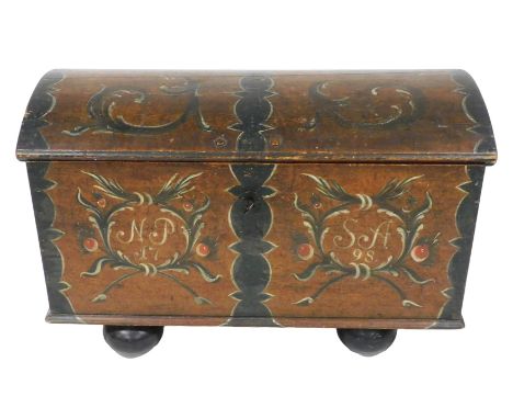 A 18thC Continental scumbled and painted pine chest, possibly Scandinavian, with a domed lid, painted with foliate scrolls, t