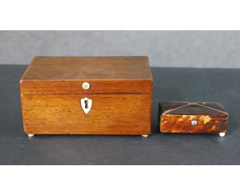 A 19th century mahogany tea caddy along with a Georgian tortoiseshell sarcophagus form box. H.5.5 W.12 D.7.5cm 