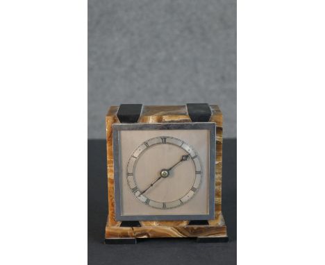An Art Deco onyx and marble mantle clock with chrome face. H.14 W.12 D.7cm 
