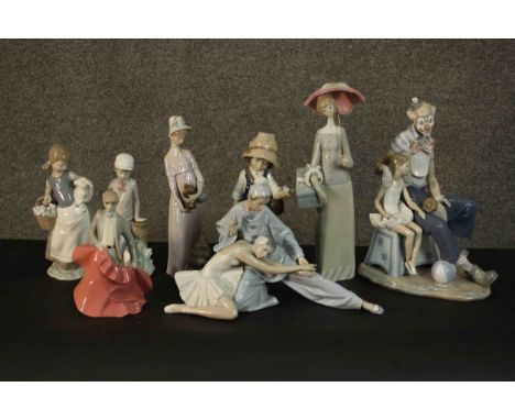 A collection of eight hand painted porcelain figures. Makers include Nao and Lladro. H.38 W.10 D.8cm. (largest) 