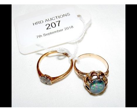 Opal ring in gold mount, together with one other 