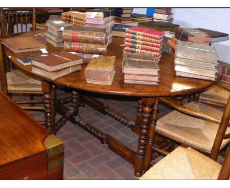 Circular country drop-leaf dining table on turned bobbin supports - 170cm x 150cm 