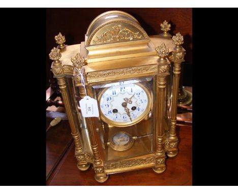 An impressive 19th century ormolu mantel clock with decorative enamel dial, the striking movement by Japy Freres, having orna
