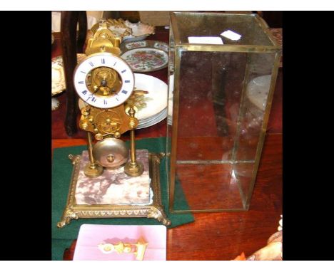 An unusual antique skeleton clock striking on bell, the enamel dial marked Vincent & Co., Madras - under glass dome 