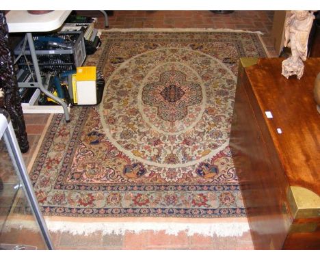 A Mashad Persian carpet with floral border and centre medallion, having leaping Deer - 220cm x 160cm 