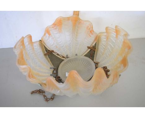 An early 20th Century moulded shell formed glass and metal ceiling light fitting