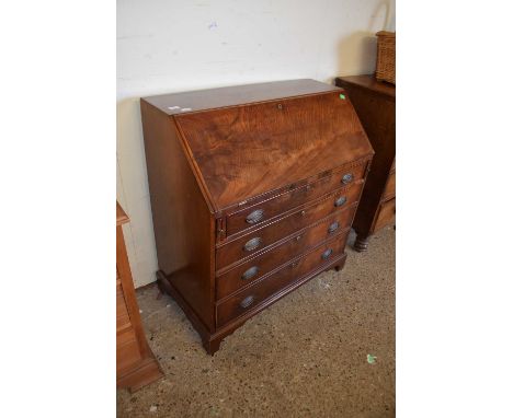 George III mahogany bureau of typical form with full front opening to an interior with small drawers and pigeon holes over a 