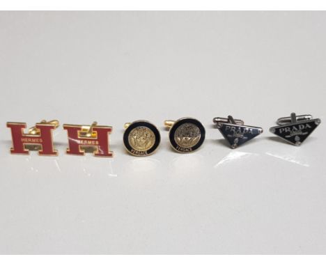 Three pairs of cufflinks&nbsp;In the Style of Hermes, Versace and Prada.