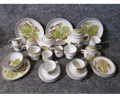A Denby stoneware part dinner and tea service to include dinner plates, tea cups etc.