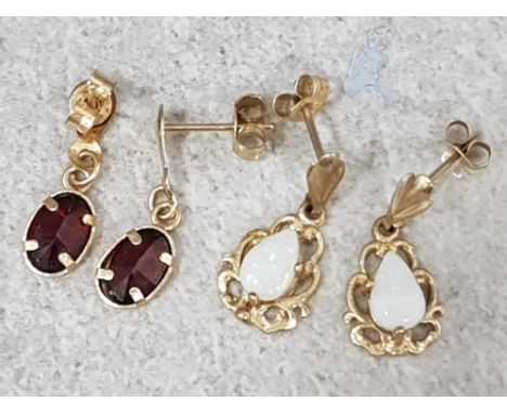 2 pairs of 9ct yellow gold drop earrings including 1 with opal drops &amp; 1 with garnet drops, 1.4g gross