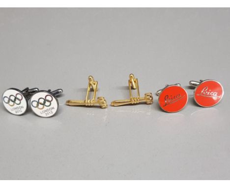 Three pairs of cufflinks in the Style of London 2012 Olympics, gavels, and Leica.