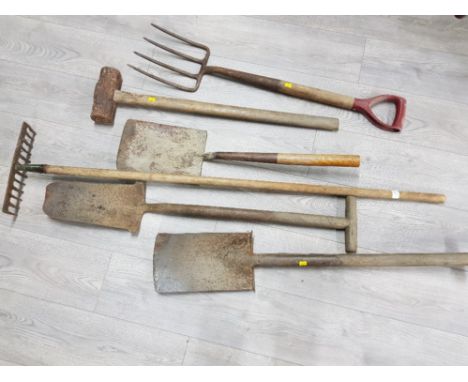 Antique gardening tools to include spades and fork etc.