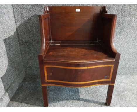 A late 19th/early 20th century inlaid mahogany commode with liner and lids.