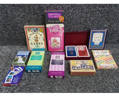 A selection of vintage playing card sets all wih original boxes