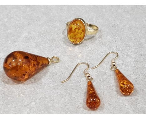 9ct yellow gold synthetic amber ring , drop earrings + matching pendant. Ring size 0