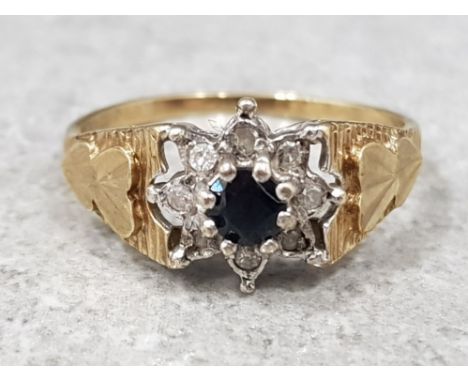 Ladies 9ct yellow gold sapphire &amp; diamond cluster ring, featuring a black sapphire in the centre surrounded by eight roun