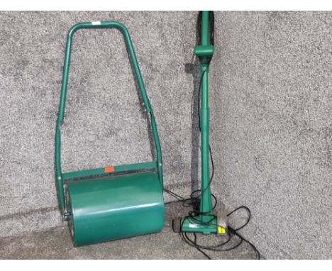 A garden roller and an electric garden tool.