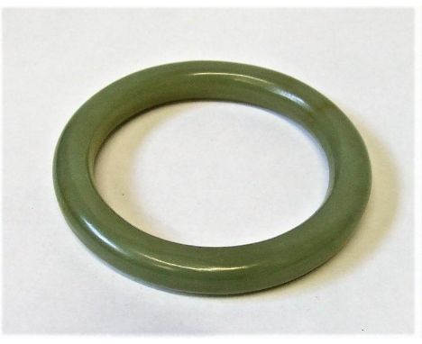 Jade Slave Bangle, external measurement 3 1/4" 