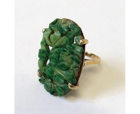 Yellow Metal Unmarked Ladies Dress Ring with carved Jade oval lotus flower in basket setting size N 1 1/2" x 3/4" 