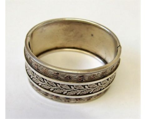 White &amp; Yellow Metal Mounted Wide Hinged Bangle, 1 side plain the other central decoration of oak leaves &amp; acorns wit