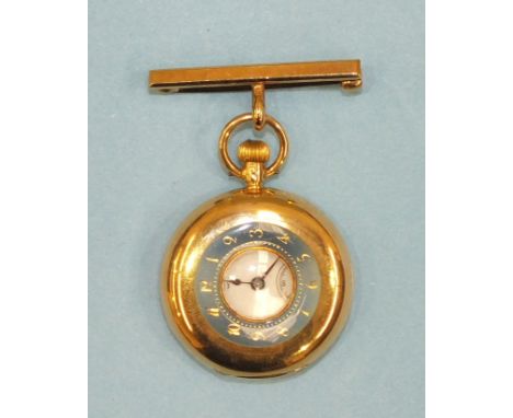 A ladies small 15ct gold half hunter keyless pocket watch, the outer case with pale blue enamelled bezel and gold Arabic nume