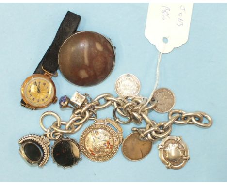 A silver bracelet with swivel fob seal, a seal/compass, a large medallion for "Shanghai Municipal Police Boxing Club 1935", 1